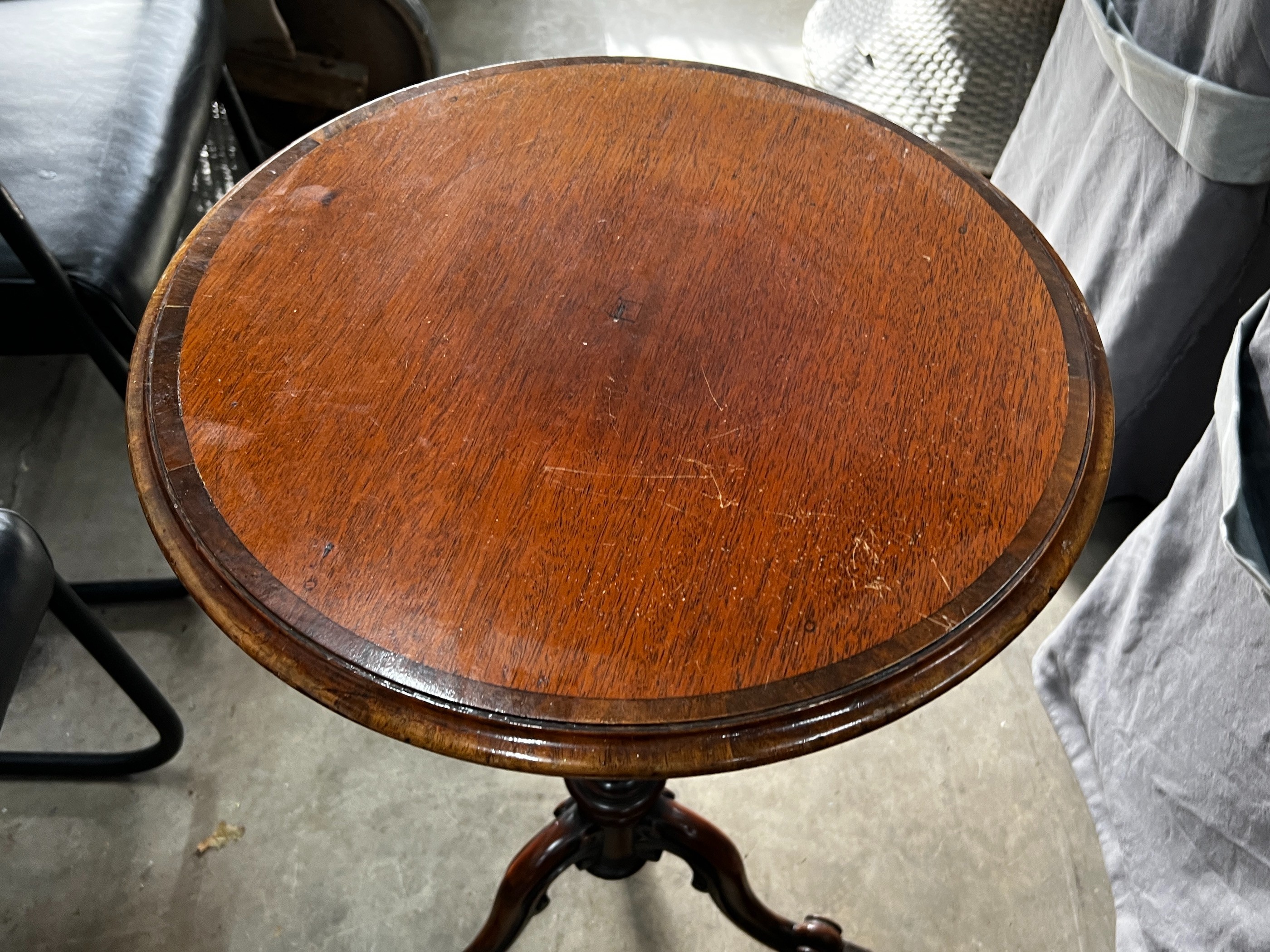 A Victorian and later circular mahogany wine table, bears T & G Seddon paper label, diameter 46cm, height 74cm